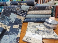 Fabric collection and precuts called Indigo Blooming