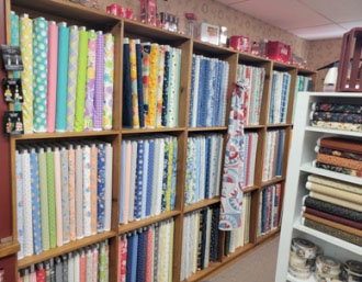 More Moda fabrics on southeast wall.