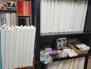 Shelves of white on white fabrics